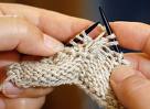 picture of someone knitting